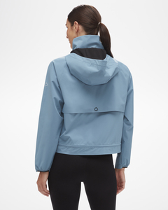 Women's Shavano Jacket Shown in Blue Haze Color, view from the back of the model