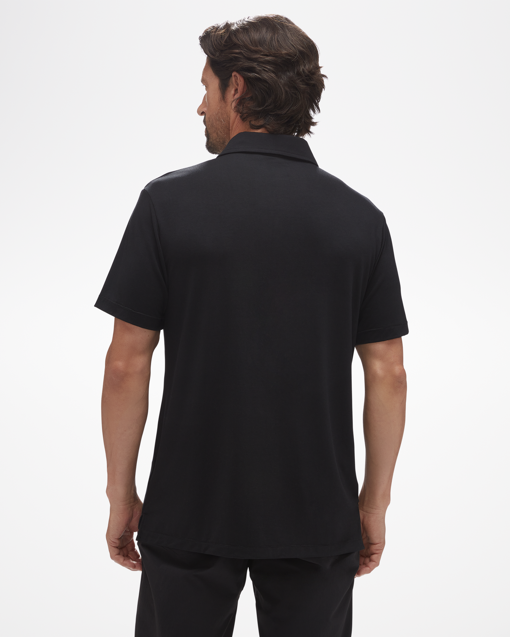 Aspen Collection black polo from the back