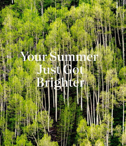 Forest with text overlay 'Your Summer Just Got Brighter'