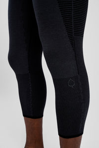 Black leggings with textured pattern on a white background