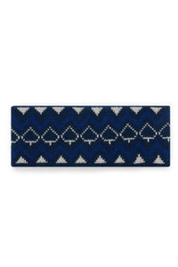 Navy blue headband with white geometric pattern on a white background