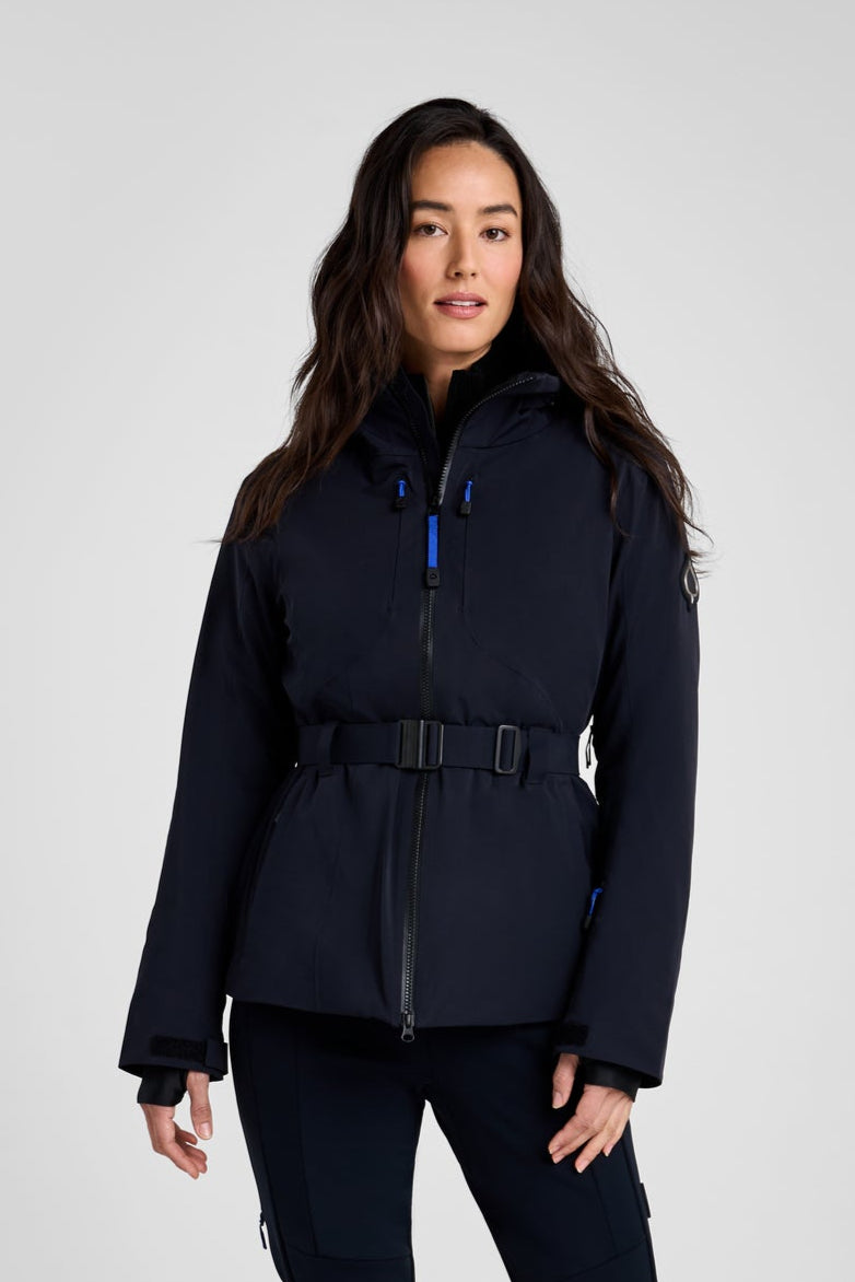 Person wearing a black snowsuit on a white background
