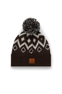 Knitted beanie with a pom-pom on a white background