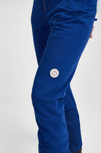 Blue pants with a brand logo on a white background