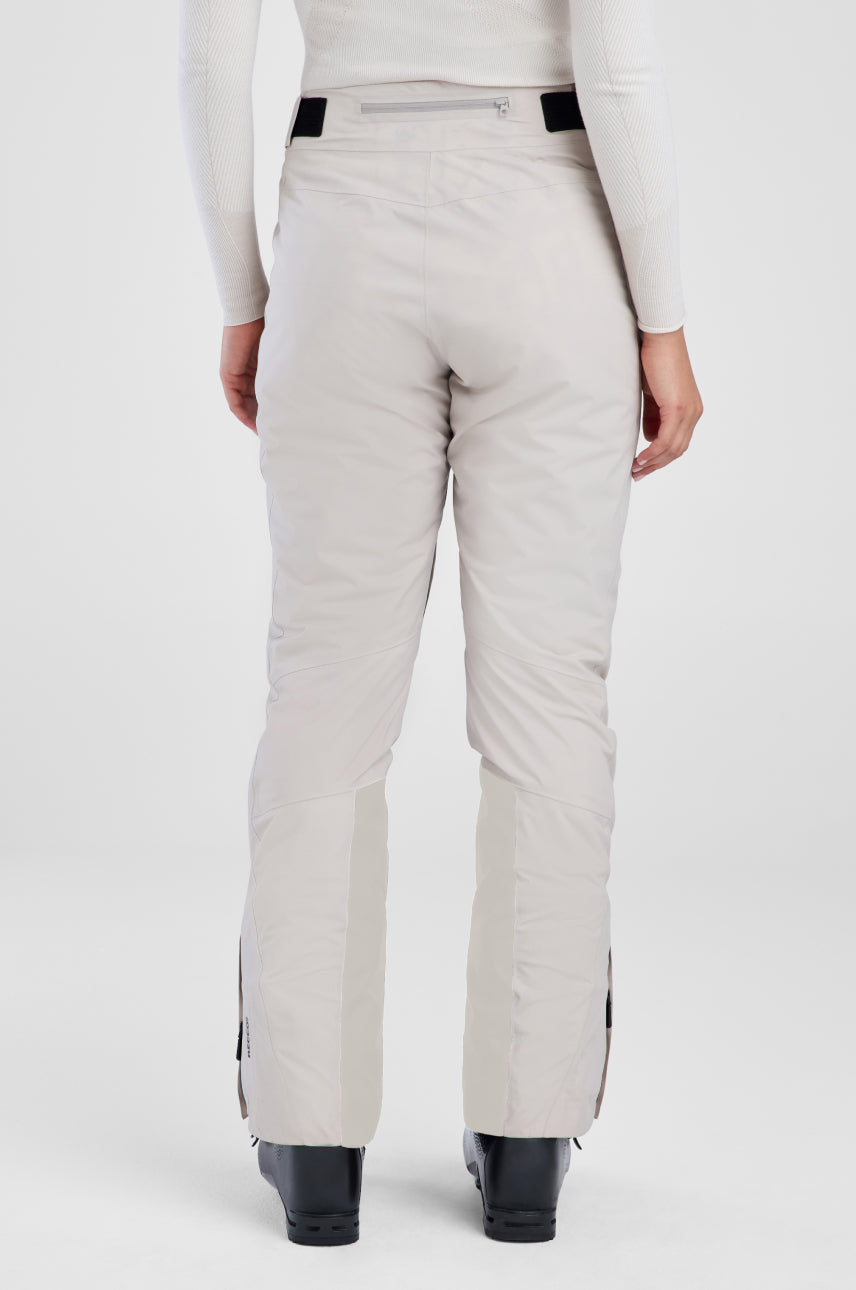 Light gray pants worn by a person on a white background