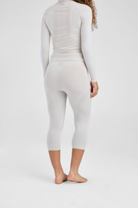 Back of beige baselayer set on model