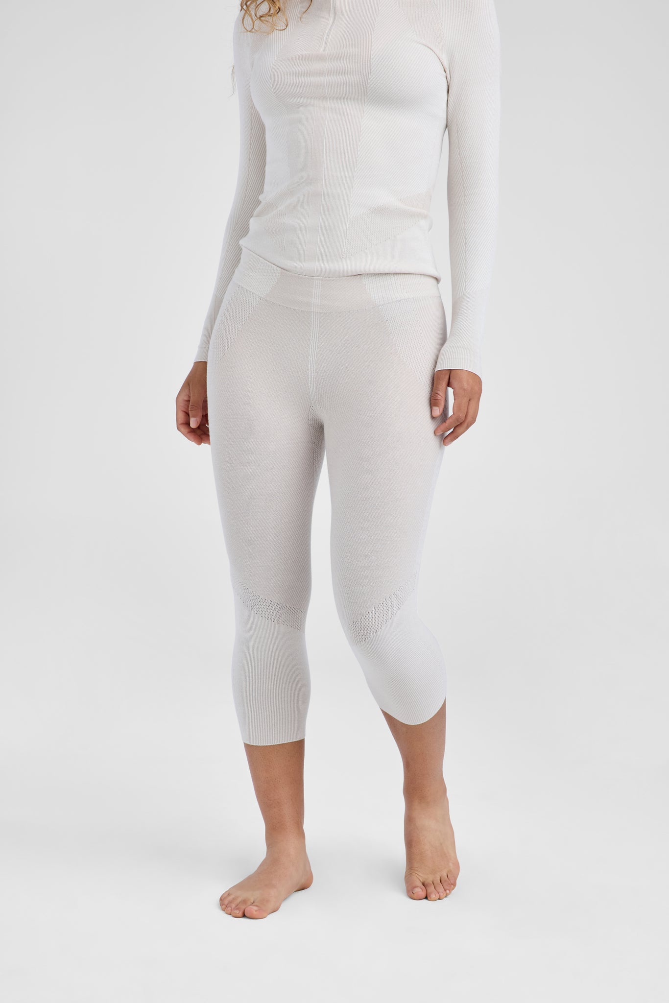 front of beige baselayer set on model