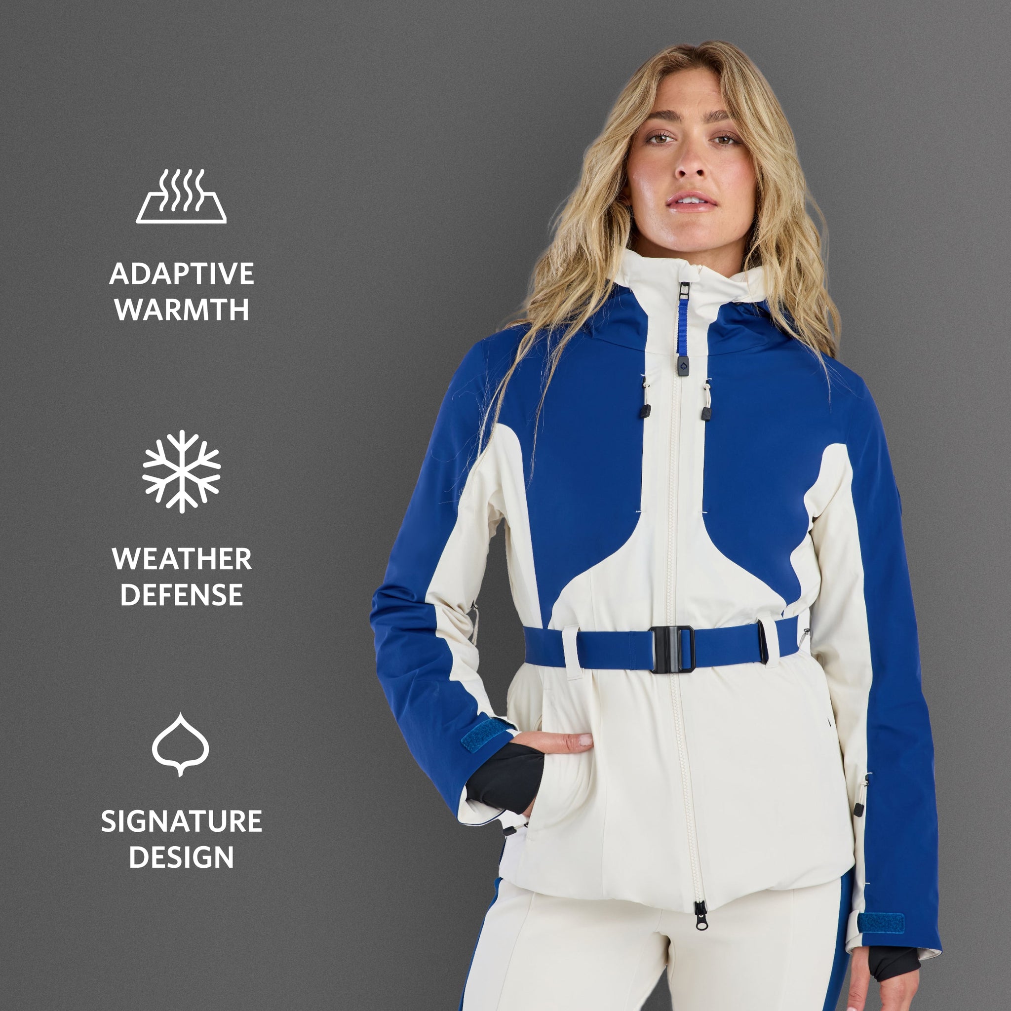 Person wearing a blue and white ski jacket with promotional text and branding elements.