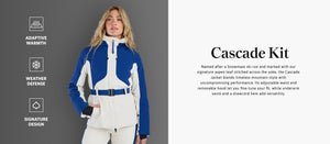 Person wearing a blue and white ski jacket with text on the right side.
