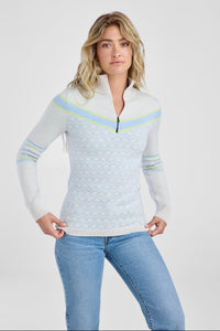 Women in white and light blue patterned sweater
