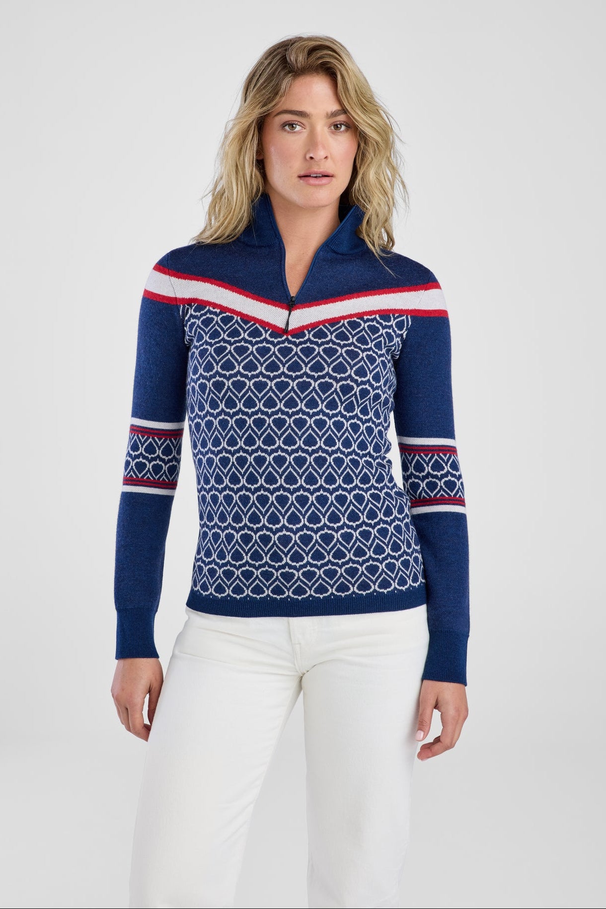 Women in navy and red patterned sweater