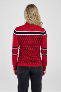 Women in red and black patterned sweater