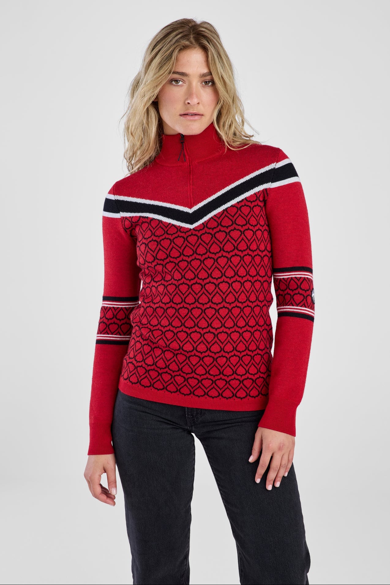Women in red and black patterned sweater